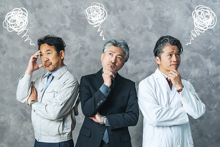 悩む経営者